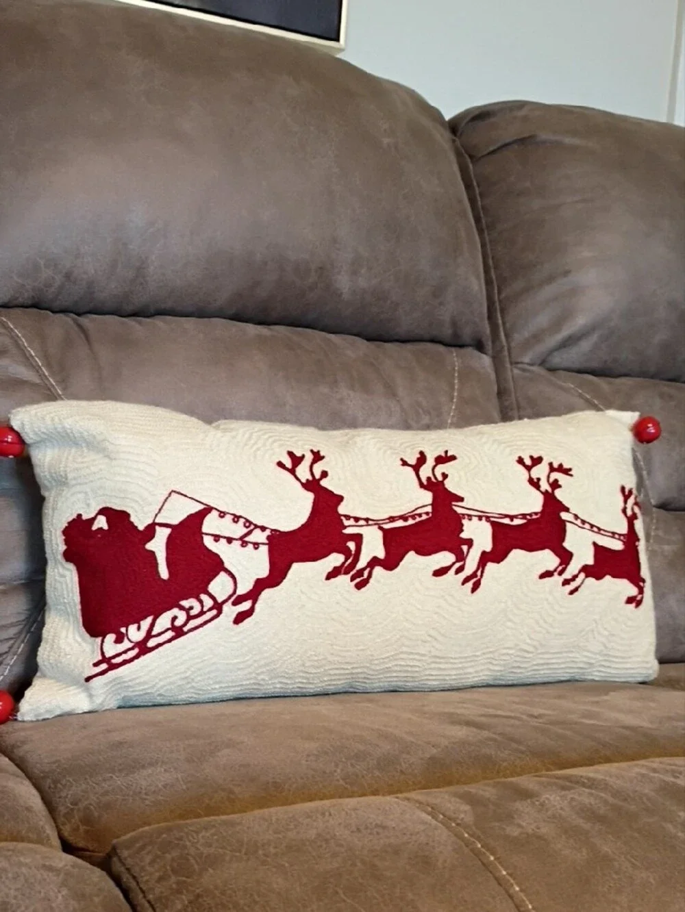 Festive Red Reindeer Lumbar Pillow on Cream